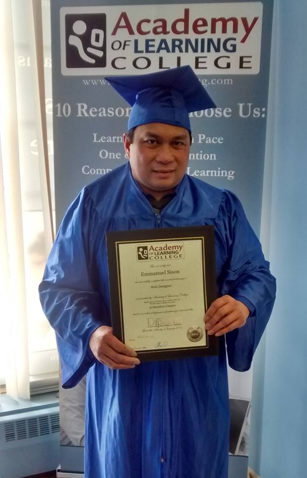 Graduate in blue cap and gown holding a diploma certificate in front of an Academy of Learning Career College banner.