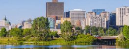 Ottawa skyline with Parliament buildings and riverfront park