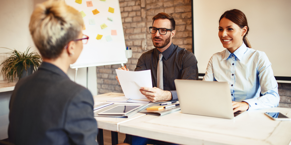 A candidate inquiring about career advancement, development resources, and industry representation opportunities in a job interview.