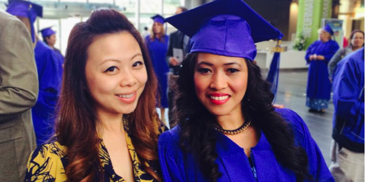 An AOLCC graduate celebrating with her proud family, showcasing the benefits of targeted career training in British Columbia for a brighter future.