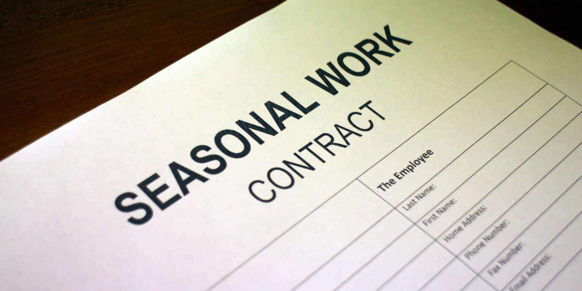 A signed seasonal work contract, illustrating temporary job opportunities for unemployed individuals.